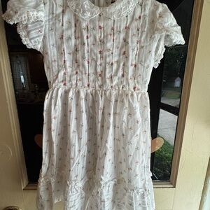 Polly Finder’s Charming White Flocked Floral Kids Dress
